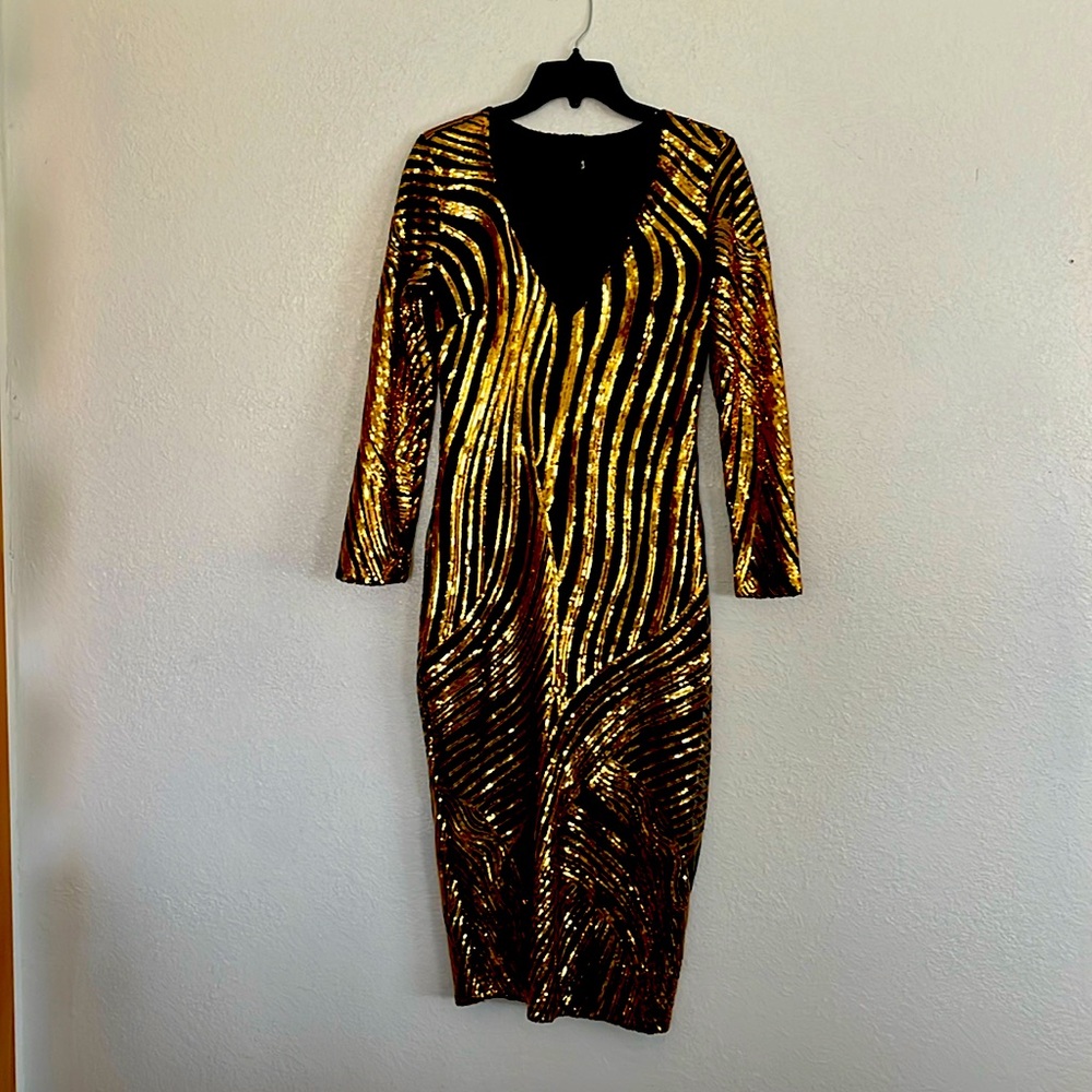Black and gold sequin dress